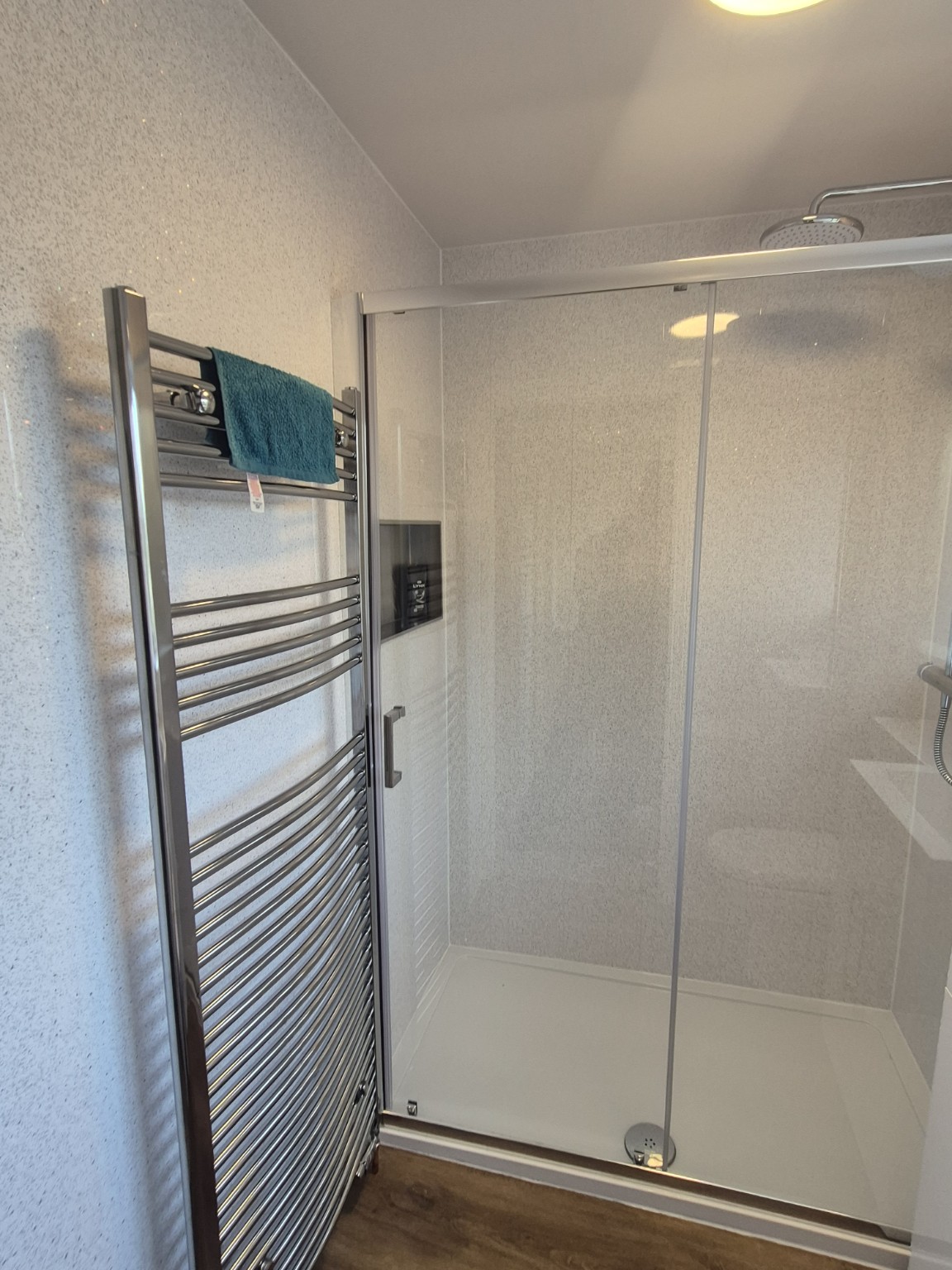 Bathroom Refurbishment - Finished walk-in shower and chrome towel radiator